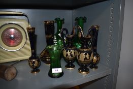 A selection of Greek styled ceramics and hand decorated green glass vase