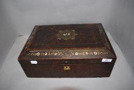 A Victorian walnut cased writers or haberdashery case having mother of pearl and brass inlay