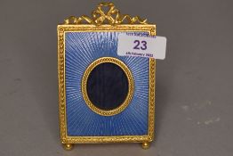 A small ormolu picture or photo frame by Kitney and Co of London