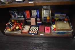 A mixed lot of vintage games including snooker balls, Kan-U-go, Dominos and more.