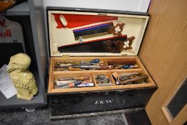 An early 20th century cabinet makers wood workers tool chest with contents including Disston saw