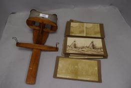 An antique stereoscope and a collection of photographs, of gold mining interest.