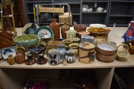 A good quantity of varied studio pottery including vases, bowls, plates and more.