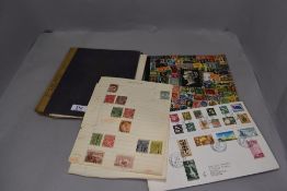 A selection of collectable world stamps in two albums