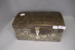 A vintage biscuit tin by Nurnburg in the form of a strong box or treasure chest