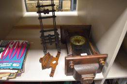 A mahogany cased wall clock having carved details and finiakls to base, AF, also a small scale