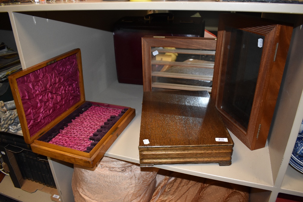 A selection of display cases and similar wooden cutlery cases