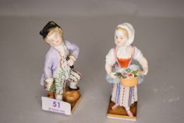 A pair of porcelain figures bearing marks for Dresden to base