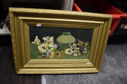 A mid century styled oil painting of an abstract pansy flower scene in a gilt frame