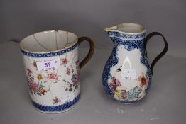 A Chinese or oriental jug with metal handle and mug with reed bound metal handle,both having hand