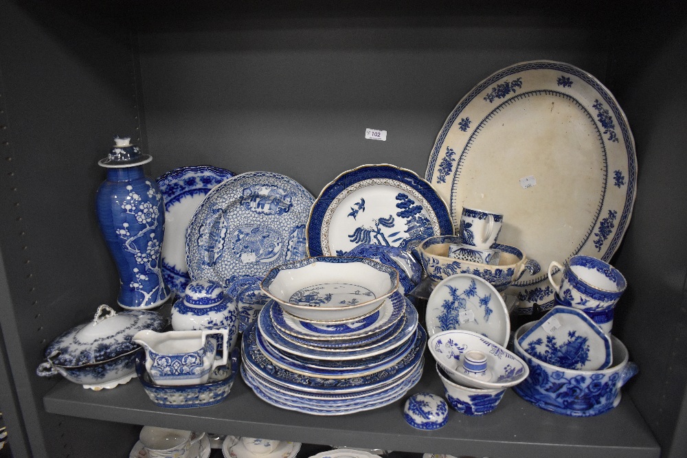 A large collection of blue and white ware including Woods ware, Meakin, Booths and more.