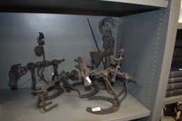 Four wrought iron and chain figure sculptures including dog and knight