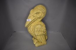 A concrete cast garden figure of a Pelican style bird approx 45cm high