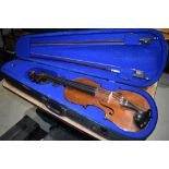 A traditional violin, having 2 piece back, approx 14in, stamped to back 'Peter Guarnerius, Anno