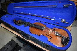 A traditional violin, having 2 piece back, approx 14in, stamped to back 'Peter Guarnerius, Anno