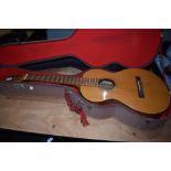 A vintage Framus parlour guitar body, no strings/bridge etc, would make a nice renovation project,