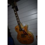 An Epiphone Emperor Joe Pass signature electric arch top guitar, with hard shell case (justincase