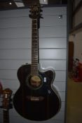 A 2008 Anniversary Washburn Jumbo electro acoustic , Cumberland model J27SCE , Java wood body,