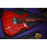 A Westone Spectrum MX electric guitar, in red, with padded gig bag