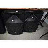 A pair of Thump 15 1000W powered loud speakers