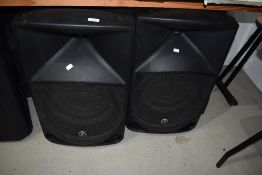 A pair of Thump 15 1000W powered loud speakers