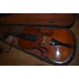 A traditional violin, having two piece back, approx 14in, in period wooden case, labelled