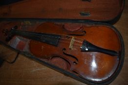A traditional violin, having two piece back, approx 14in, in period wooden case, labelled