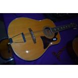 A vintage jumbo Grandesa 12 string guitar