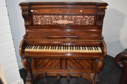 An interesting 19th Century mahogany pianette (73 keys) having fretwork back panel , and animalistic