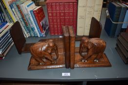 Wooden Bookends. One having adjustable sliding shelf, the other having an Elephant design. (2)