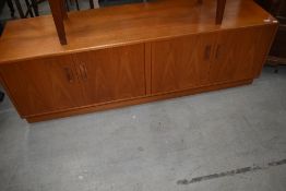 A mid century teak dresser base or under cupboard possibly G plan