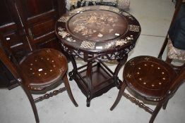 A Vietnamese breakfast table and two chairs having extensive mother and pearl inlay decoration,
