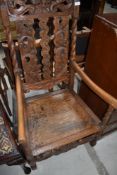A traditional period oak Carolean style carver chair, having been stripped