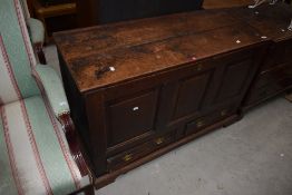 A period oak mule chest with drawer base, width approx. 117cm