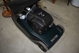 A Hayter Harrier 48 petrol lawnmower, ready for the spring!