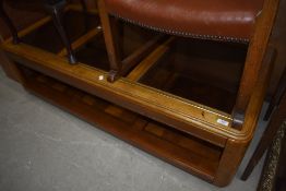 A vintage part glass topped coffee table