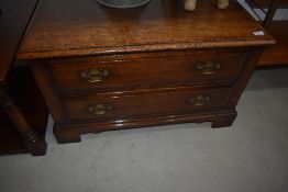 A modern quality reproduction Titchmarsh & Goodwin style TV base unit, having false drawer front,