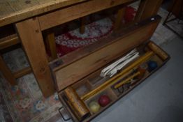 A vintage croquet set in box labelled Spalding 3
