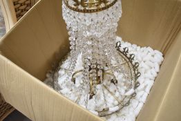 A vintage glass chandelier, of drop coronet design