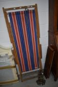 A traditional 'I Do Like To Be Beside The Seaside ' folding deckchair
