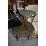 A 20th century brass top Eastern on wood base, and a similar table