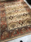 A modern polypropylene carpet square, by Next having cream and brown floral decoration, 198 x 275cm
