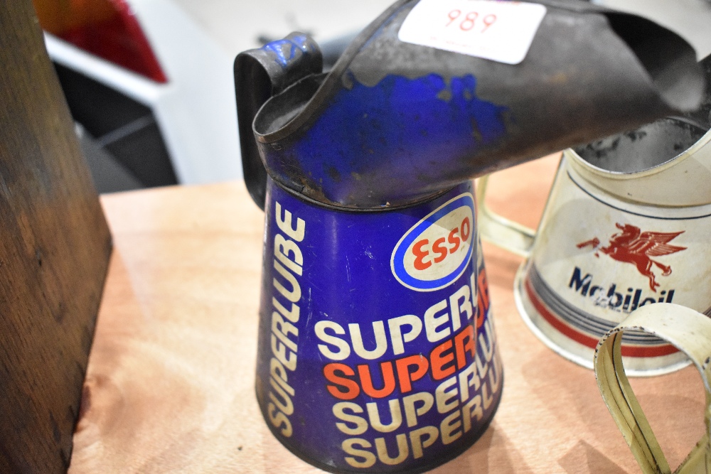 An advertising oil jug for Esso superlube