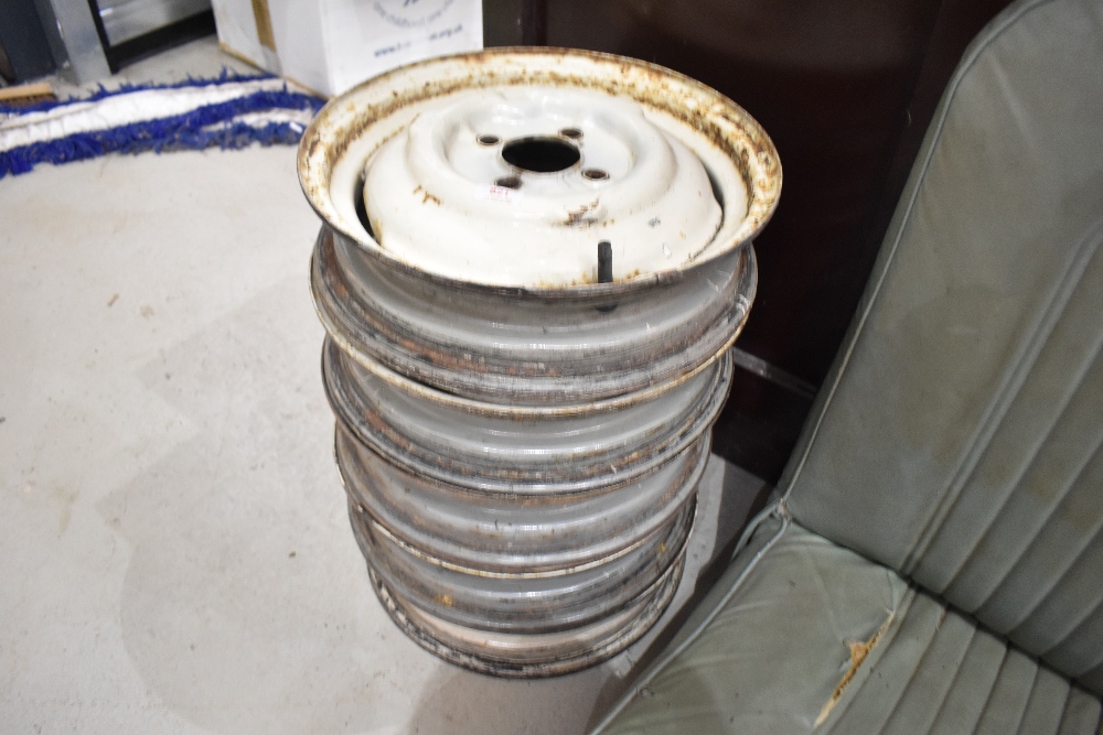 A selection of Morris Minor wheel rims for a Traveller or Van