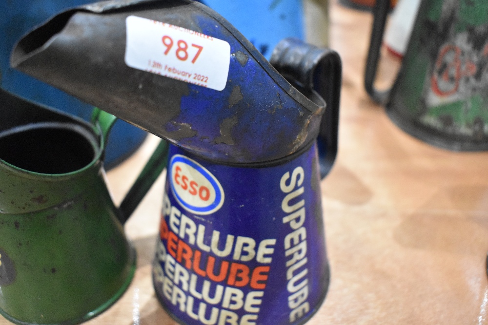 An advertising oil jug for Esso super lube