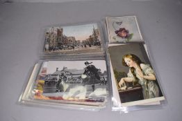 A selection of antique postcards including photographic and cartoon style