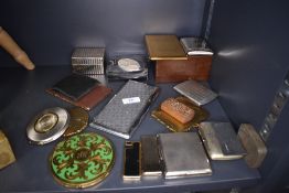 A selection of compacts cigarette lighters and machine tooled cases