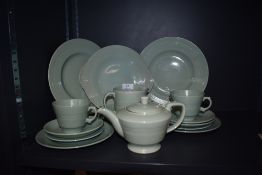 A collection of Woods ware 'Beryl' including 1 pint tea pot,cake plate, breakfast cups and