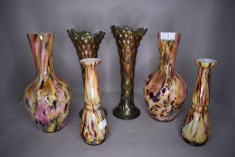 A selection of studio art glass including mottled and Loetz style vases