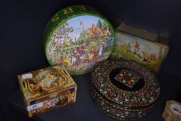 A selection of collectable transfer printed advertising tins including Hunley and Palmers rogue tin